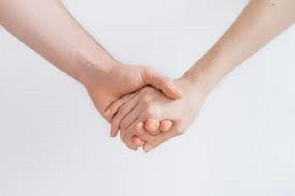 Holding Hands Hotline Logo